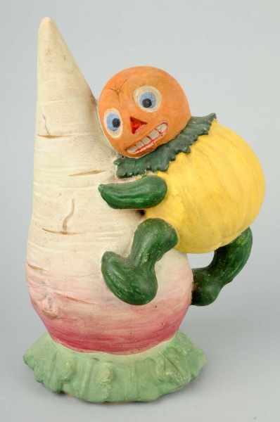 Appraisal: Pumpkin Headed Vegetable Man Candy Container Description Rare in not