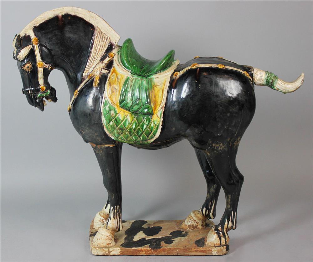 Appraisal: CHINESE TANG STYLE CAPARISONED HORSE of enormous size and standing