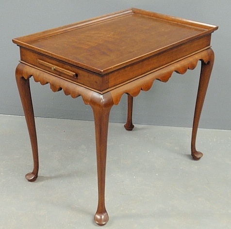 Appraisal: - Queen Anne style mahogany tea table with a rectangular