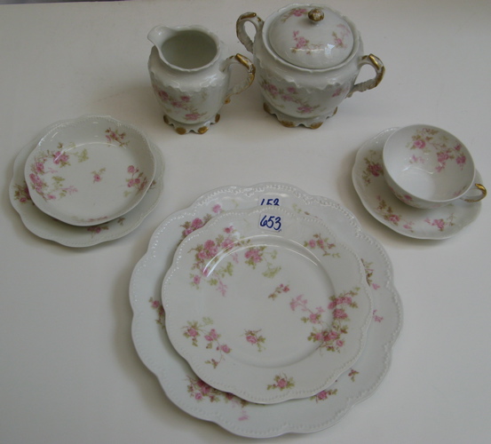 Appraisal: A PIECE HAVILAND CO CHINA SET in a small flower