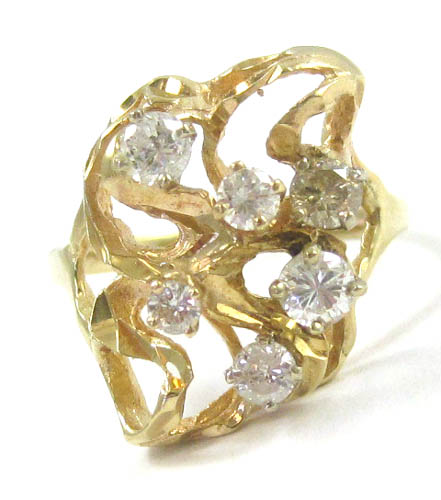 Appraisal: DIAMOND AND FOURTEEN KARAT GOLD RING set with six round-cut