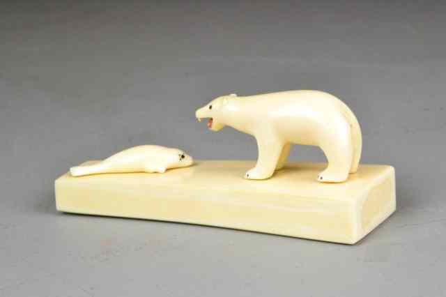 Appraisal: A Fine Ivory Inuit CarvingFinely carved to depict a bear