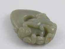 Appraisal: A Chinese jade carving of two mythical beasts x cm