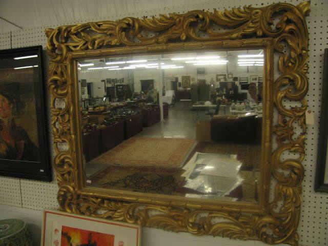 Appraisal: Ornate Framed Beveled Mirror gold finish