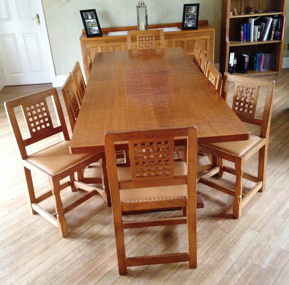 Appraisal: A Robert Thompson of Kilburn Mouseman dining suite comprising of