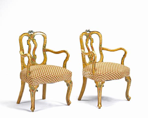 Appraisal: A pair of Venetian Rococo lacquered and paint decorated armchairs