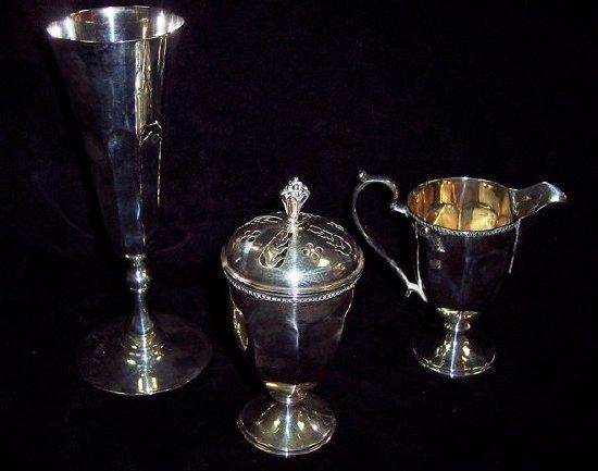 Appraisal: A trumpet shaped goblet cm high London a sugar caster