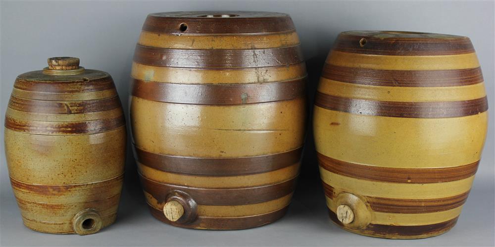 Appraisal: THREE STONEWARE SPIRIT BARRELS of assorted sizes with lifelike glaze