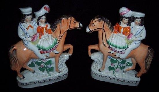 Appraisal: A pair of Staffordshire pottery named figure groups 'Going to