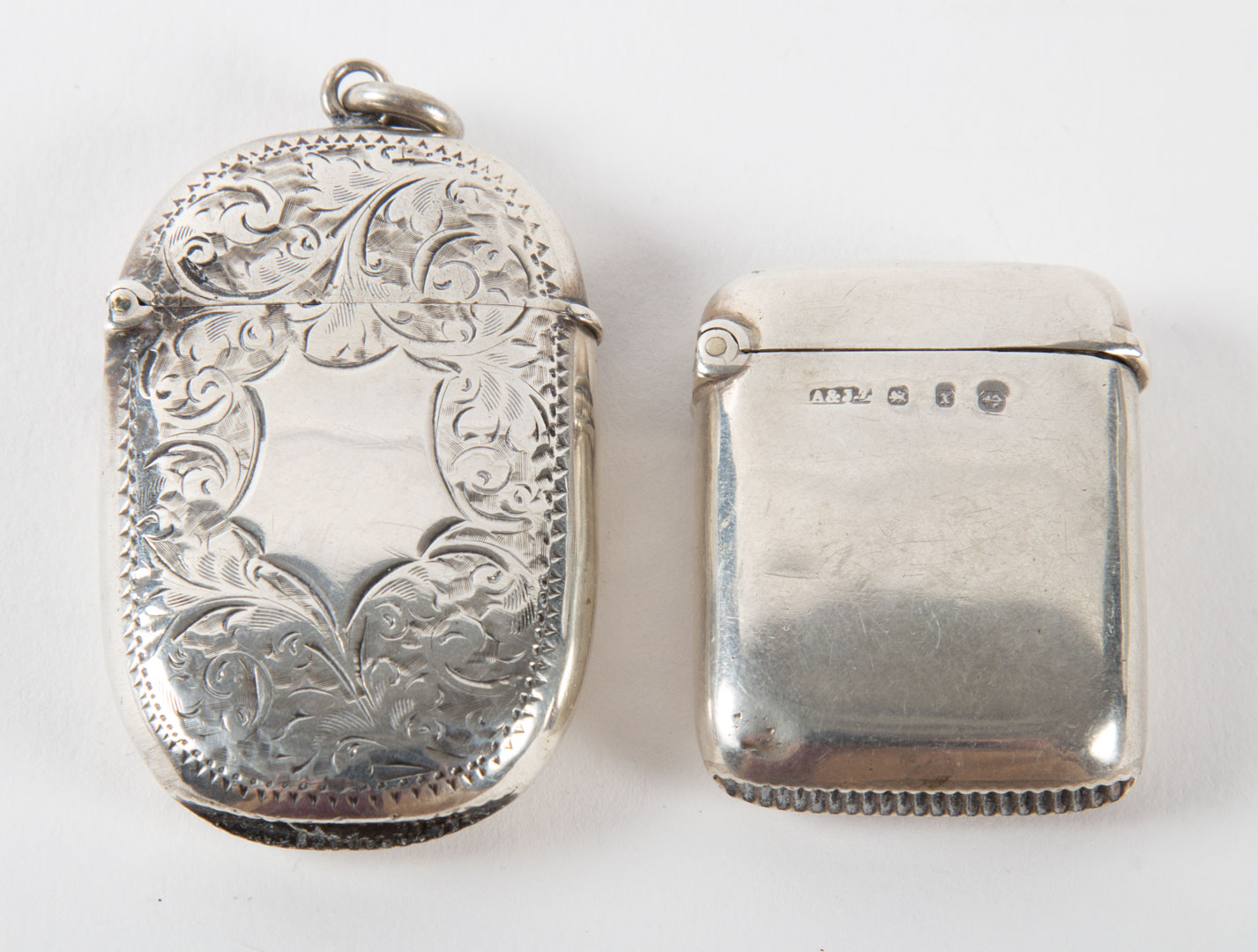 Appraisal: Two English sterling silver match safes Birmingham late th century