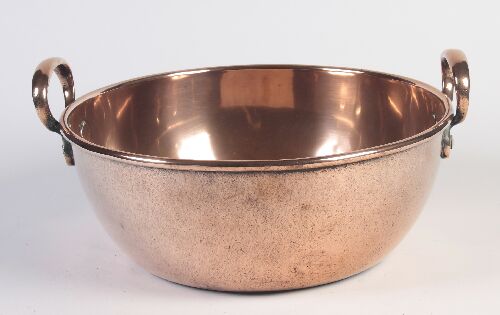 Appraisal: A th century copper two handled mixing bowl of heavy