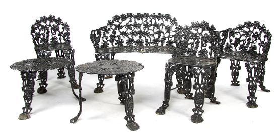 Appraisal: Set of Cast Iron Garden Furniture in the grapevine pattern