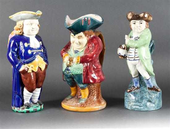 Appraisal: Minton majolica ''Squire'' toby jug Staffordshire style ''Hearty Fellow'' toby