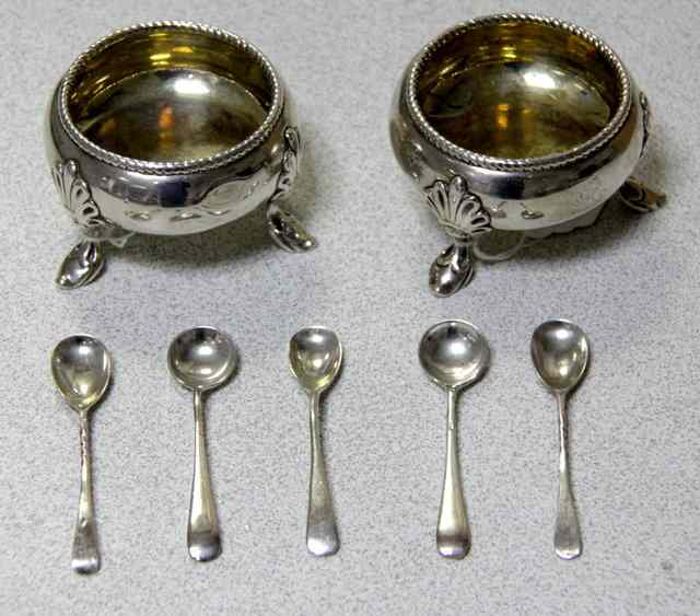 Appraisal: A pair of circular silver salts Samuel Whitford London with