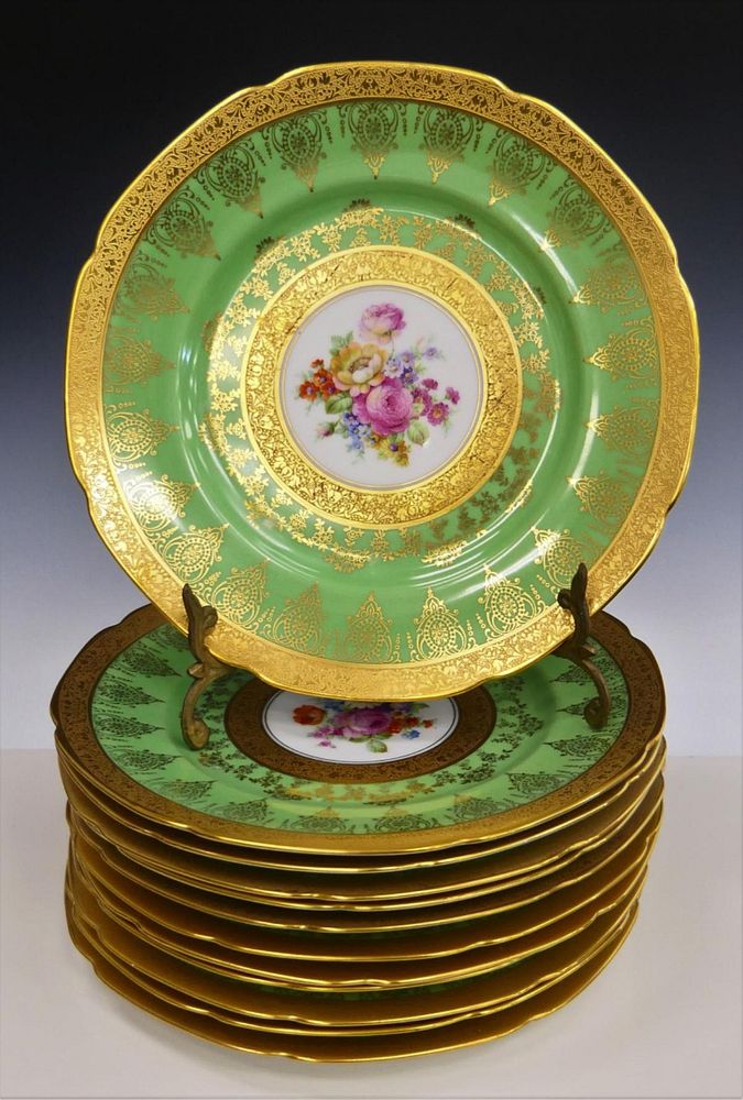 Appraisal: LIMOGES EMERALD GROUND FLORAL DINNER PLATES A set of Limoges