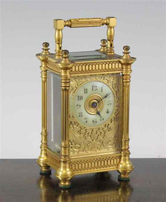 Appraisal: An Edwardian gilt brass carriage timepiece with blind fret work