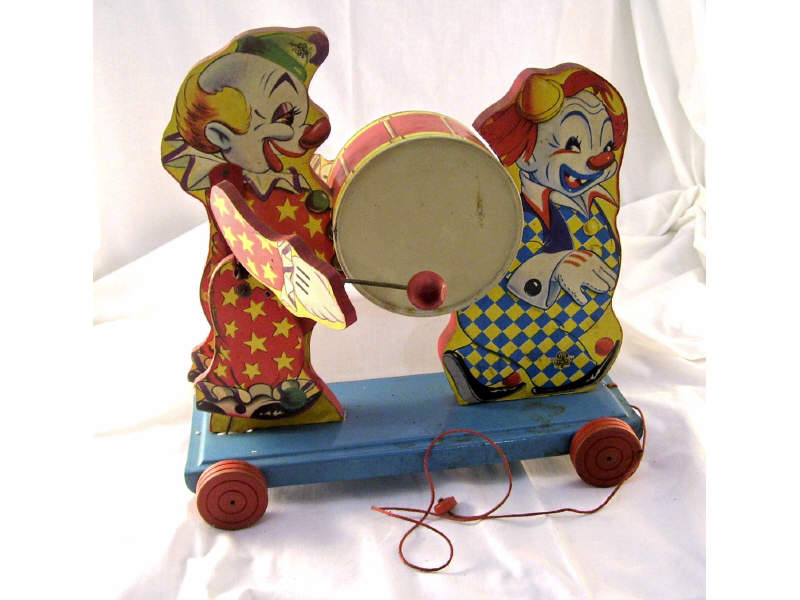 Appraisal: Gong Bell Pull Toy Clowns with drum as toy is