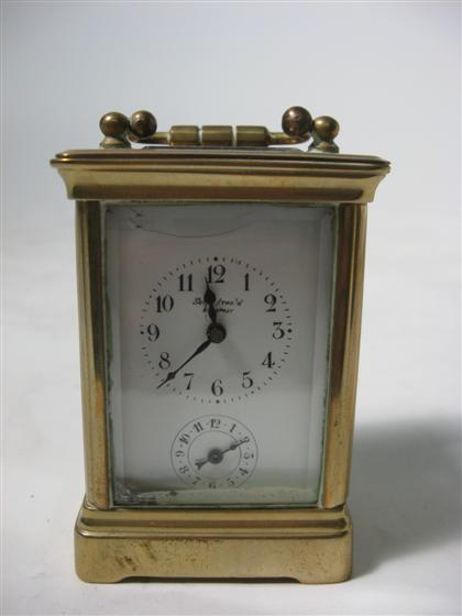 Appraisal: French brass and glass miniature carriage clock th century Typical