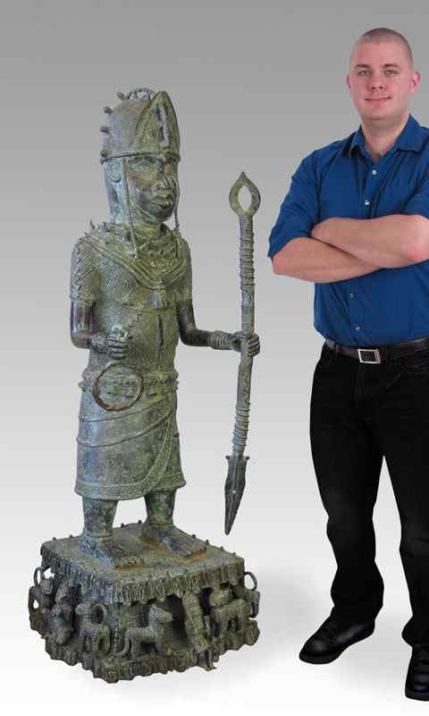 Appraisal: BENIN AFRICAN BRONZE WARRIOR SCULPTURE ON FIGURAL PEDESTAL Pedestal is