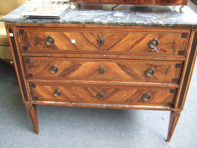 Appraisal: A late th century Continental walnut and parquetry inlaid commode