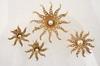 Appraisal: STARBURST SUITE - Four piece K gold and pearl starburst