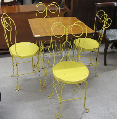 Appraisal: FIVE-PIECE CAFE TABLE AND CHAIR SET The Chicago Wire Chair