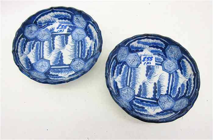 Appraisal: TWO JAPANESE IMARI BLUE AND WHITE PORCELAIN BOWLS hand painted