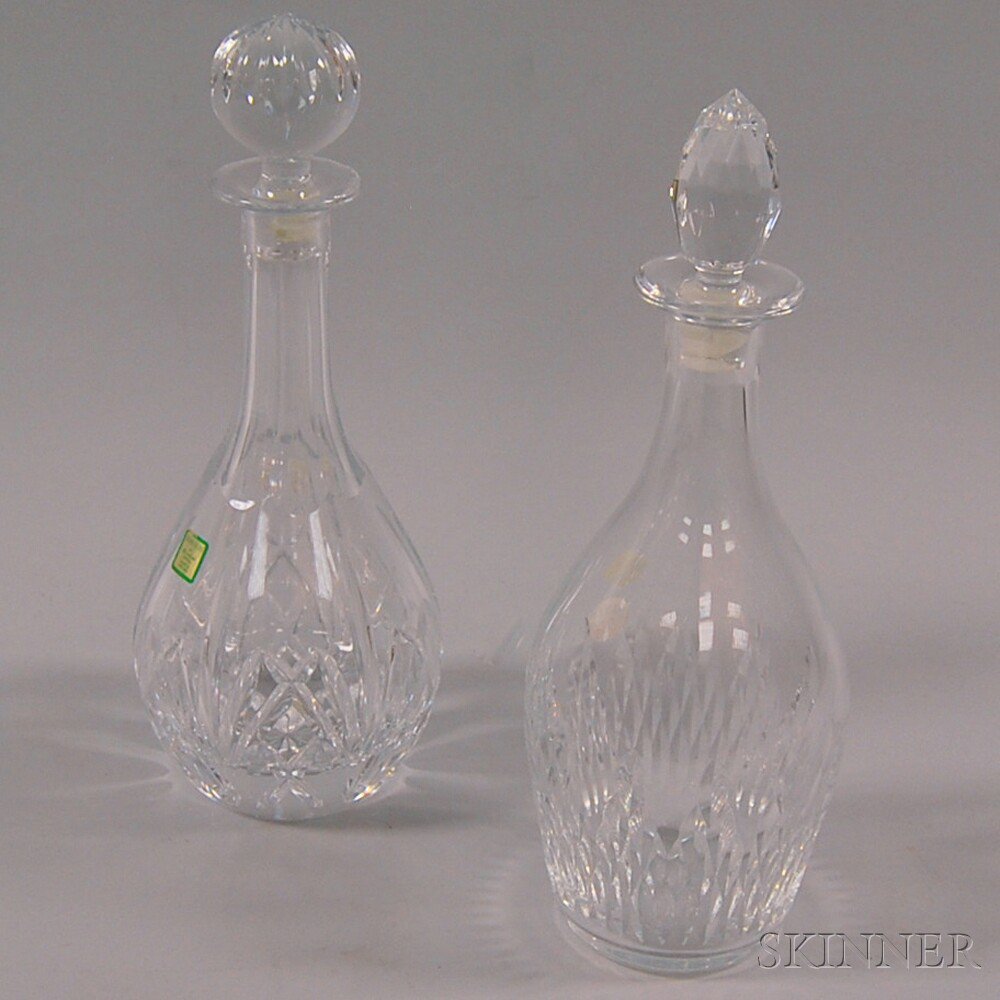 Appraisal: Two Crystal Decanters th century Waterford and Baccarat ht to