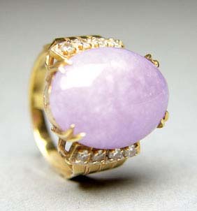 Appraisal: LAVENDER JADE AND GOLD RING K yellow gold ring set