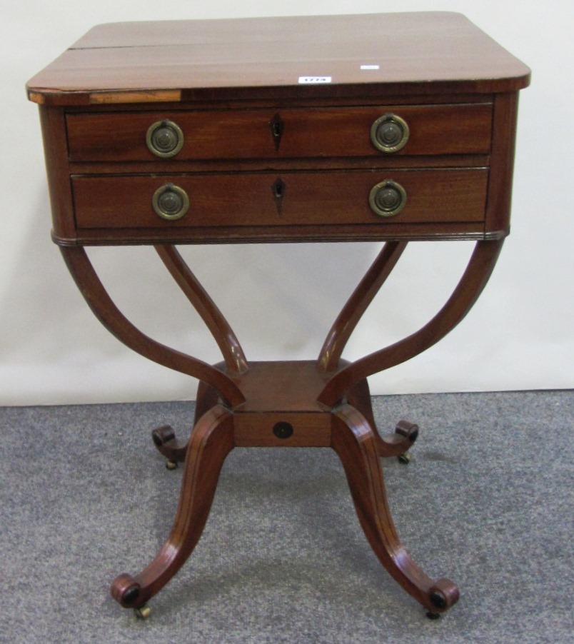 Appraisal: An early th century mahogany two drawer side table on