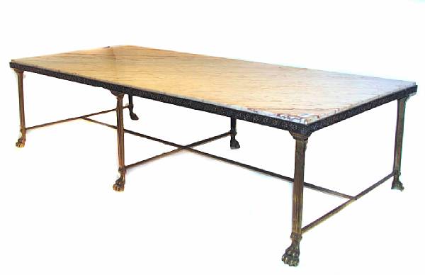 Appraisal: A Neoclassical style brass and marble topped coffee table height