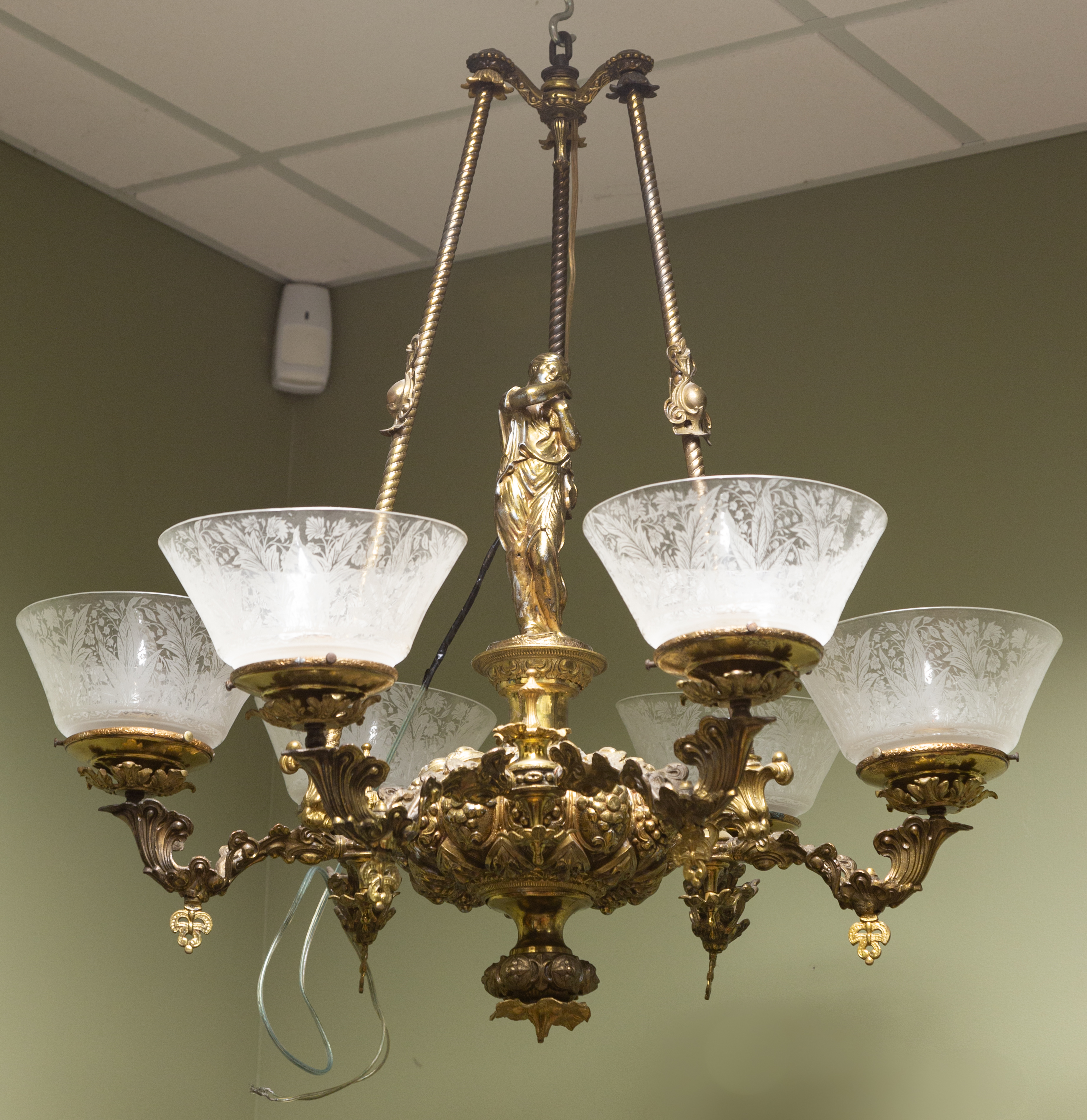 Appraisal: TH CENTURY FIGURAL BRASS CHANDELIER With arms and period shades