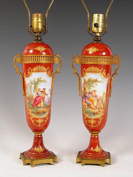 Appraisal: PAIR FRENCH PORCELAIN LAMPS Ormoulo mounted fine porcelain courting scene