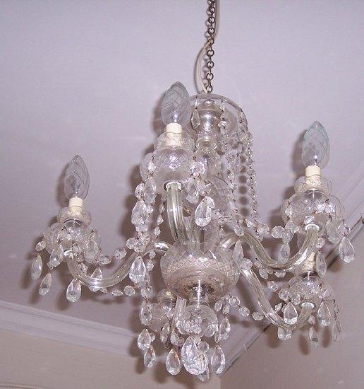 Appraisal: A glass five-branch five-light chandelier hung with glass drops