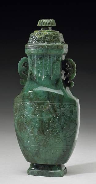 Appraisal: A 'spinach' jade covered vase Circa Of flattened hu form