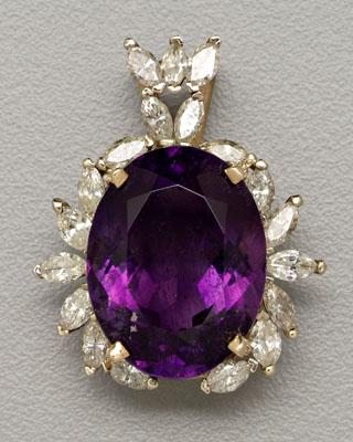 Appraisal: Amethyst diamond pendant oval faceted central amethyst estimated weight ct