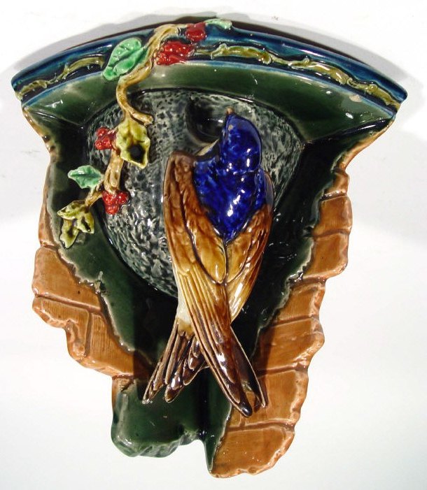 Appraisal: Sarreguemines Majolica corner wall bracket relief moulded with a bird