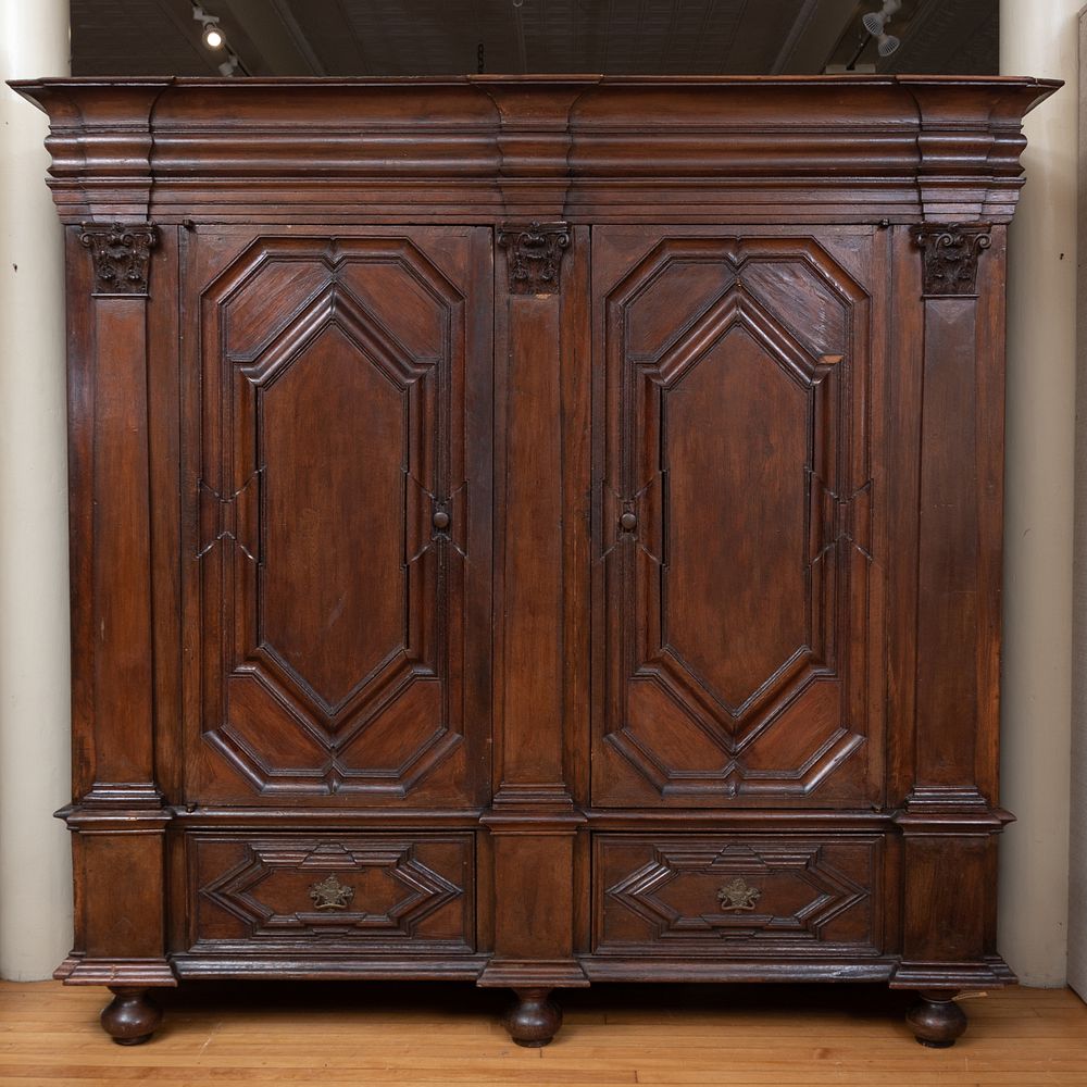 Appraisal: Large French Carved Oak Armoire Possibly Belgian The overhanging cornice