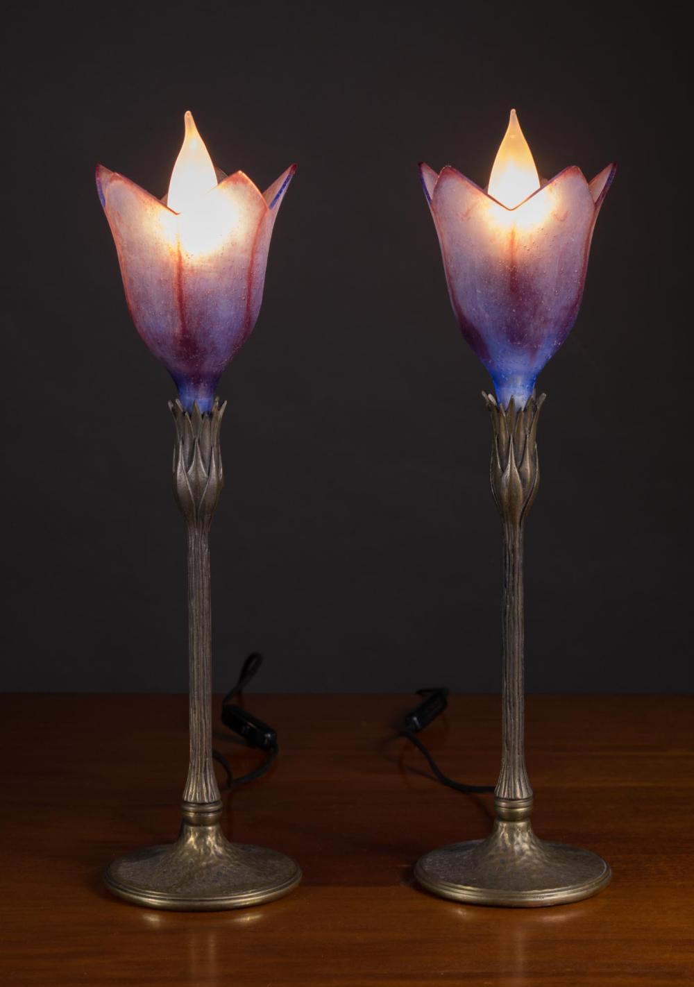 Appraisal: PAIR OF DAUM BRONZE AND GLASS 'MAGNOLIA' LAMPS France late