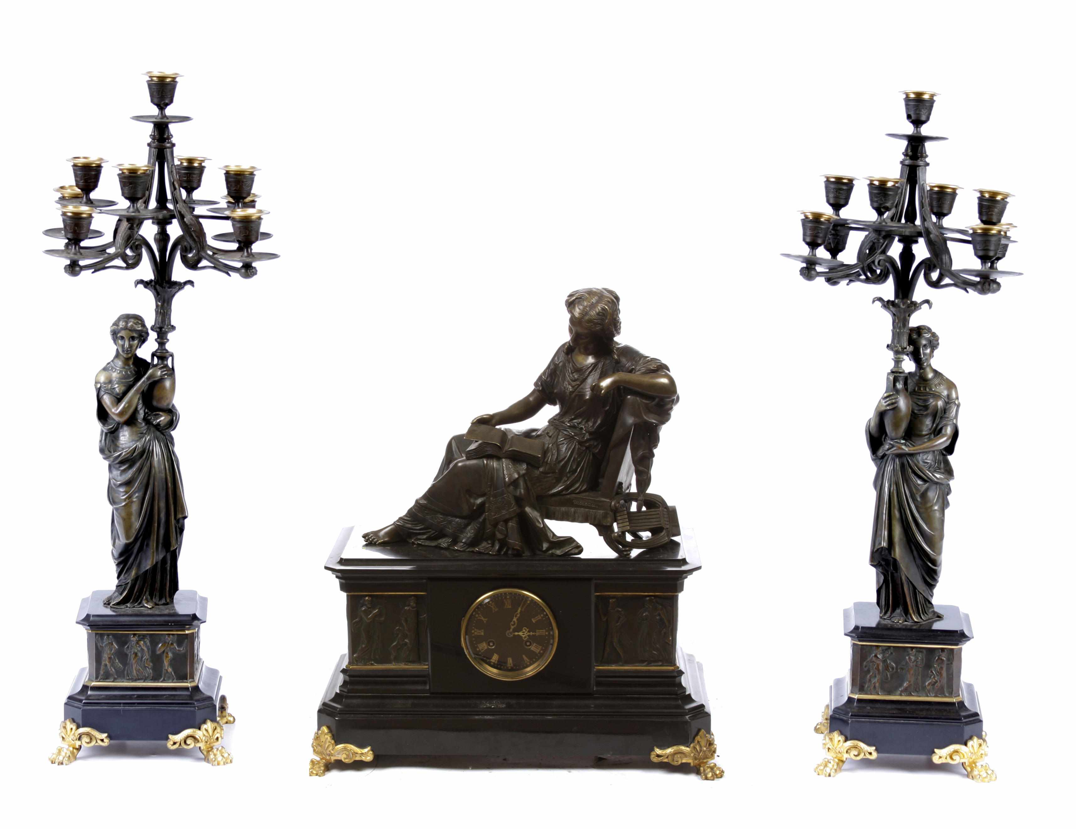 Appraisal: A Neoclassical style gilt and patinated bronze clock garniture height