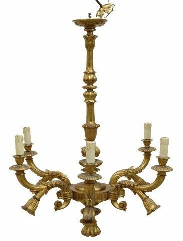 Appraisal: Italian giltwood thirteen-light chandelier th c turned and fluted standard