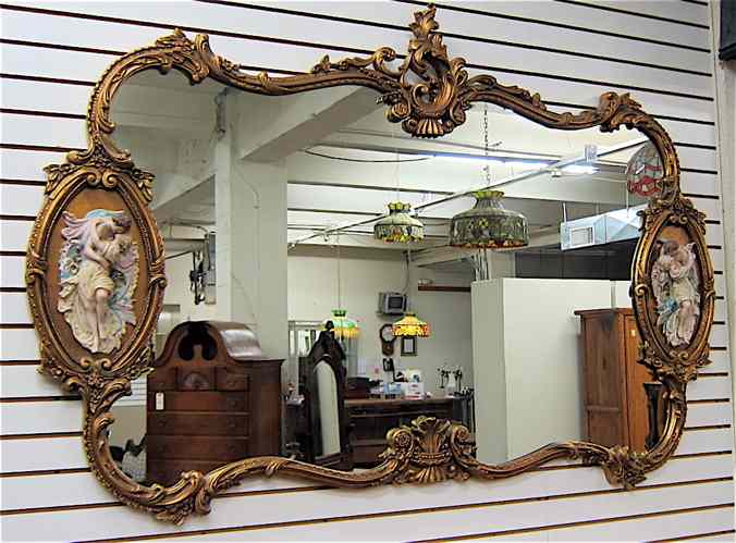 Appraisal: LARGE LOUIS XV STYLE WALL MIRROR the gold rococo scroll