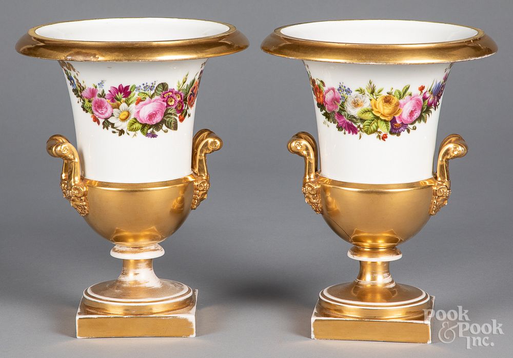 Appraisal: Pair of Tucker style painted porcelain urns Pair of Tucker