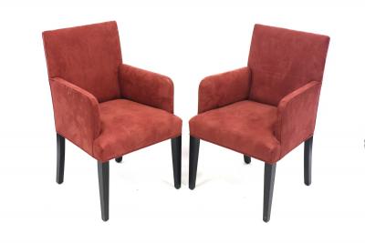 Appraisal: A pair of modern armchairs upholstered in maroon suede on