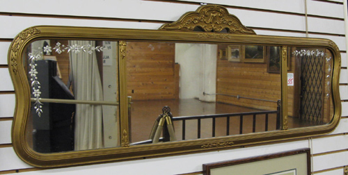 Appraisal: AN AMERICAN OVER MANTEL WALL MIRROR having engraved draped panels