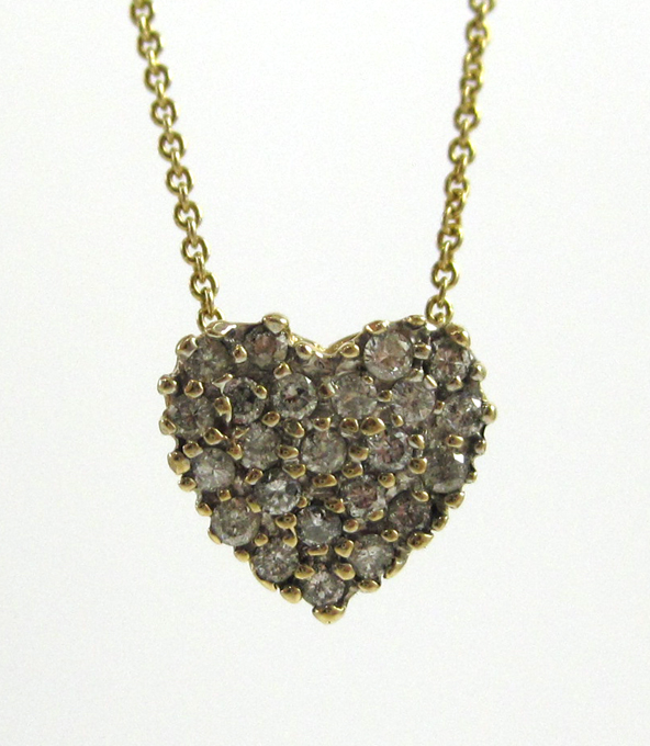 Appraisal: DIAMOND AND FOURTEEN KARAT GOLD PENDANT NECKLACE suspended on a