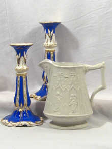 Appraisal: A pair of Ridgeway candlesticks cm high together with a