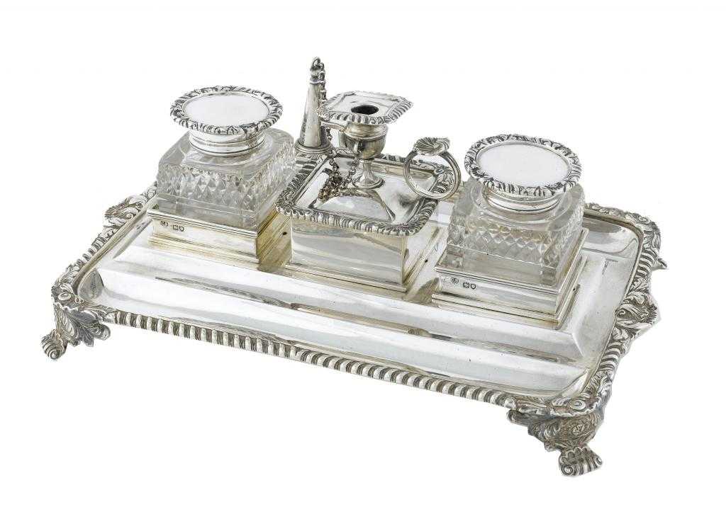 Appraisal: A VICTORIAN INKSTAND the gadrooned tray with pair of silver