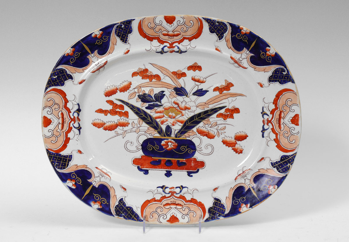 Appraisal: MASON'S IRONSTONE PLATTER Flora and urn motif center marked Mason's