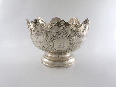 Appraisal: A late-Victorian silver presentation Monteith bowl circular form embossed with